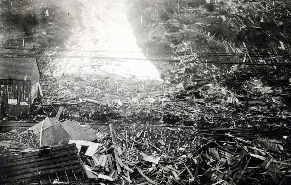 Damage from snowslide. Burke, Idaho.