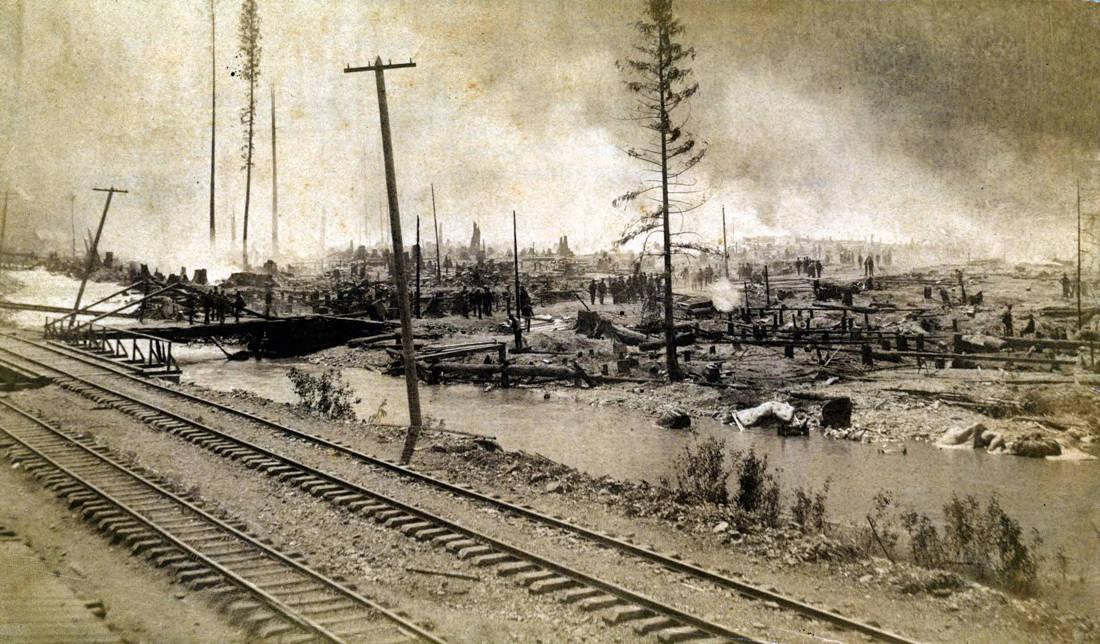 Looking southeast from Northern Pacific Depot at part of Wallace, Idaho burnt from the fire.