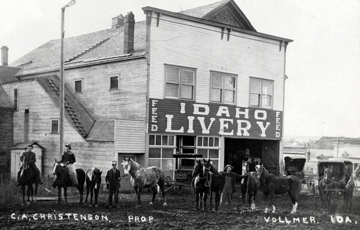 Men with horses in front of Idaho Livery. Vollmer, Idaho.